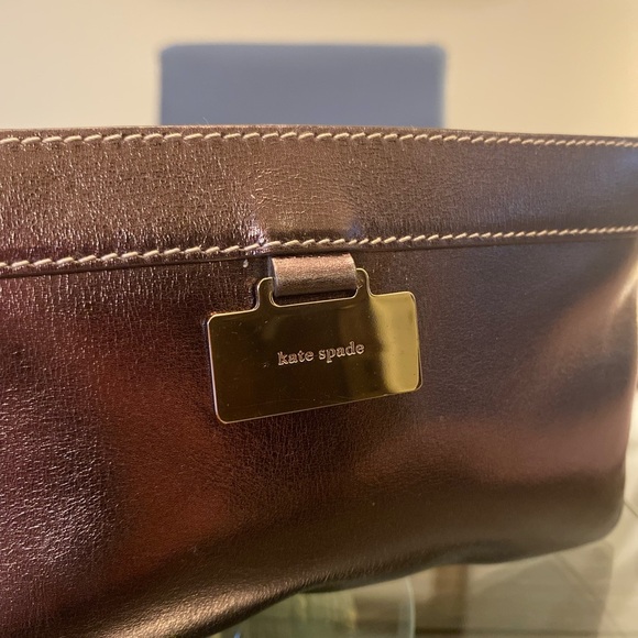 kate spade Handbags - Kate Spade Chocolate Leather Pouch with Gold Detail